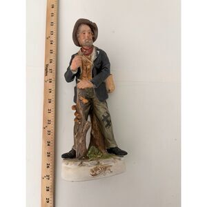 vtg. ardco 16" porcelain figurine of peasant man farmer with log